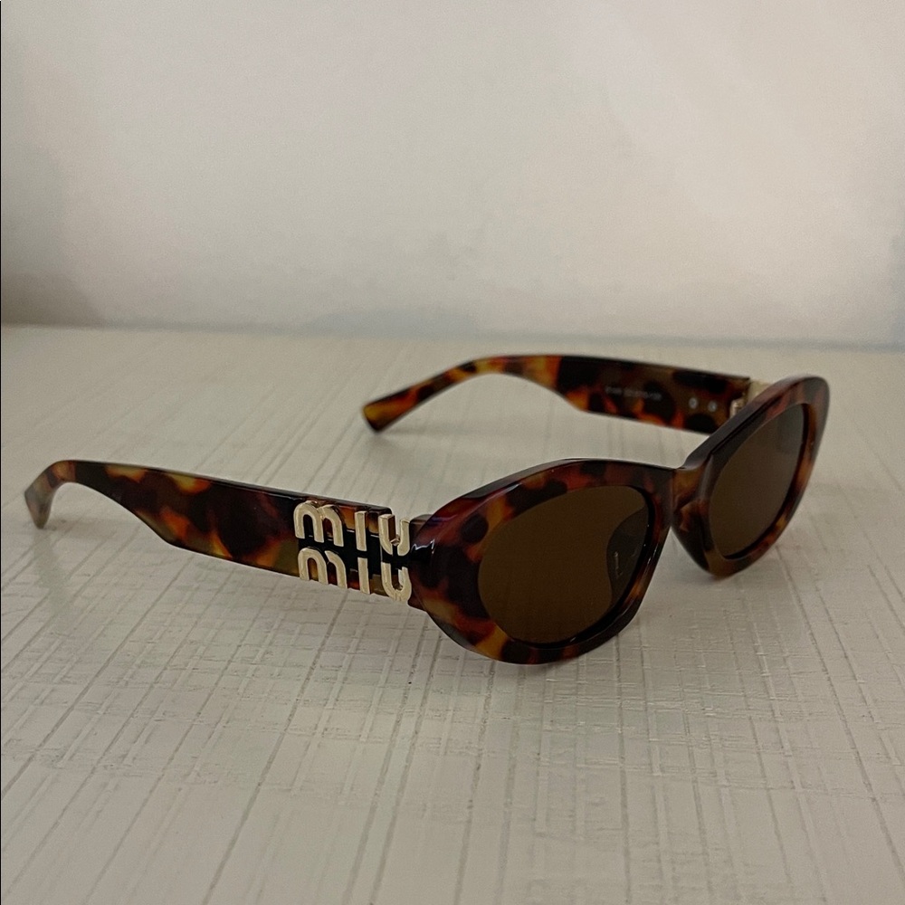 Miu Miu Tortoise Shell Sunglasses